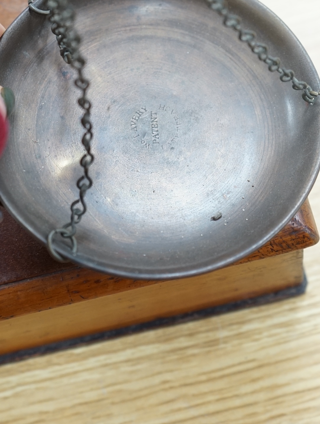 A set of Victorian mahogany and brass beam scales, by Avery, with a repair letter dated 1940 included, 45cm high. Condition - fair